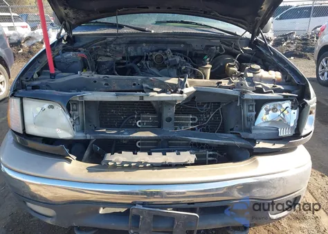 2000 Ford F-150 Lariat/Work Series/Xl/Xlt z USA, uszkodzony, nr VIN 1FTRX18W1YNA99010